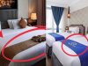 Čemu zapravo služi uska traka od tkanine preko hotelskog kreveta? Čemu zapravo služi uska traka od tkanine preko hotelskog kreveta? - featured image